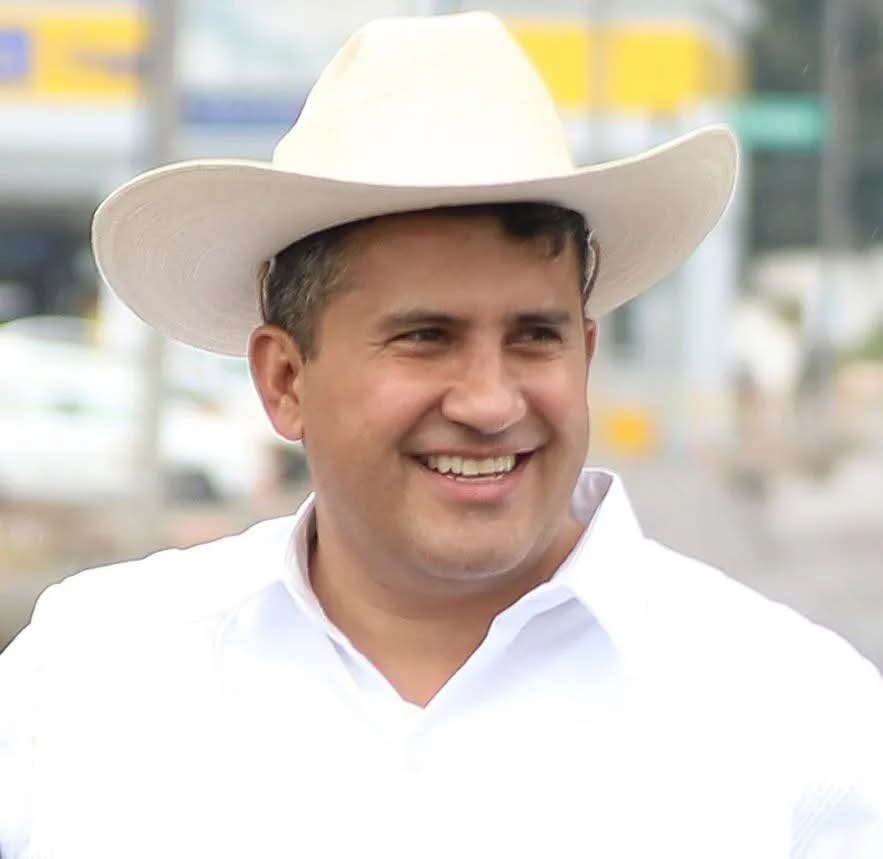 Escudo con imagen del presidente